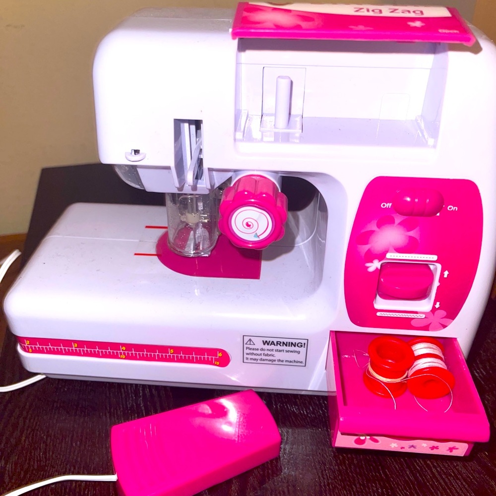 A kids toy ( sewing machine)